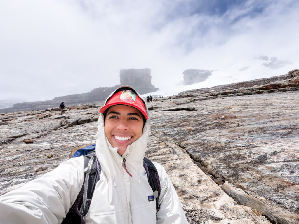 El Cocuy trek hikers at Laguna Grande de la Sierra Colombia